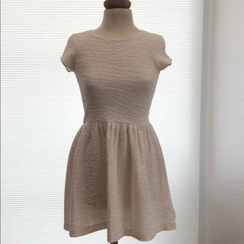 Sparkling white skater dress with back cutouts